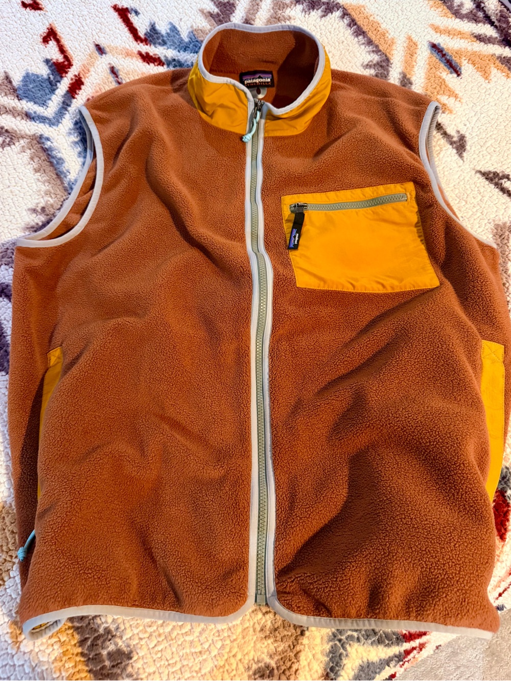 Patagonia Men's Rust Fleece Vest with Yellow Pocket